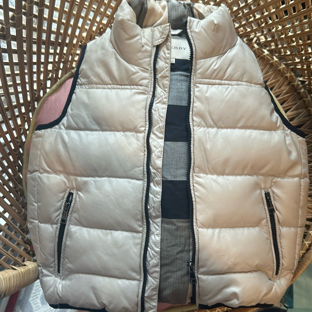 Toddler size Burberry tan puffer with traditional plaid inside.  Worn twice